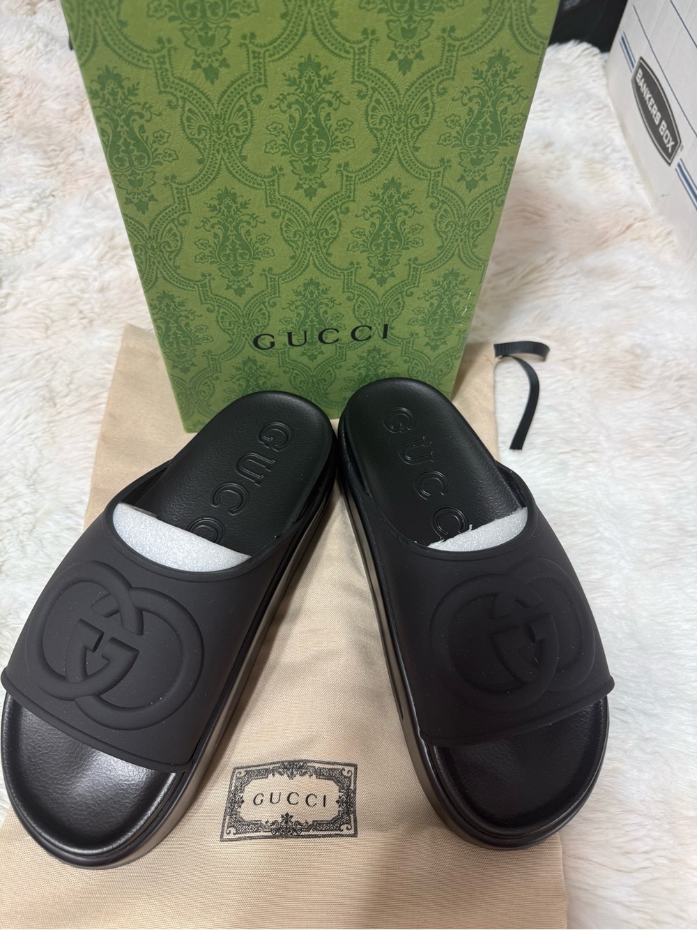 Gucci Men’s Black Embossed GG Slide Sandals
